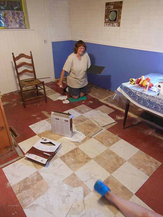 Sara laying Floor Tiles